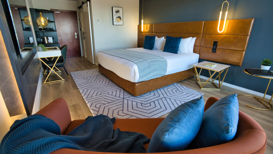 SOHO Hotel stylish bedroom with leather headboard and contemporary design